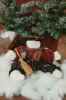 Sitting snowman doll