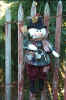 Snowman with a birdnest in his hat